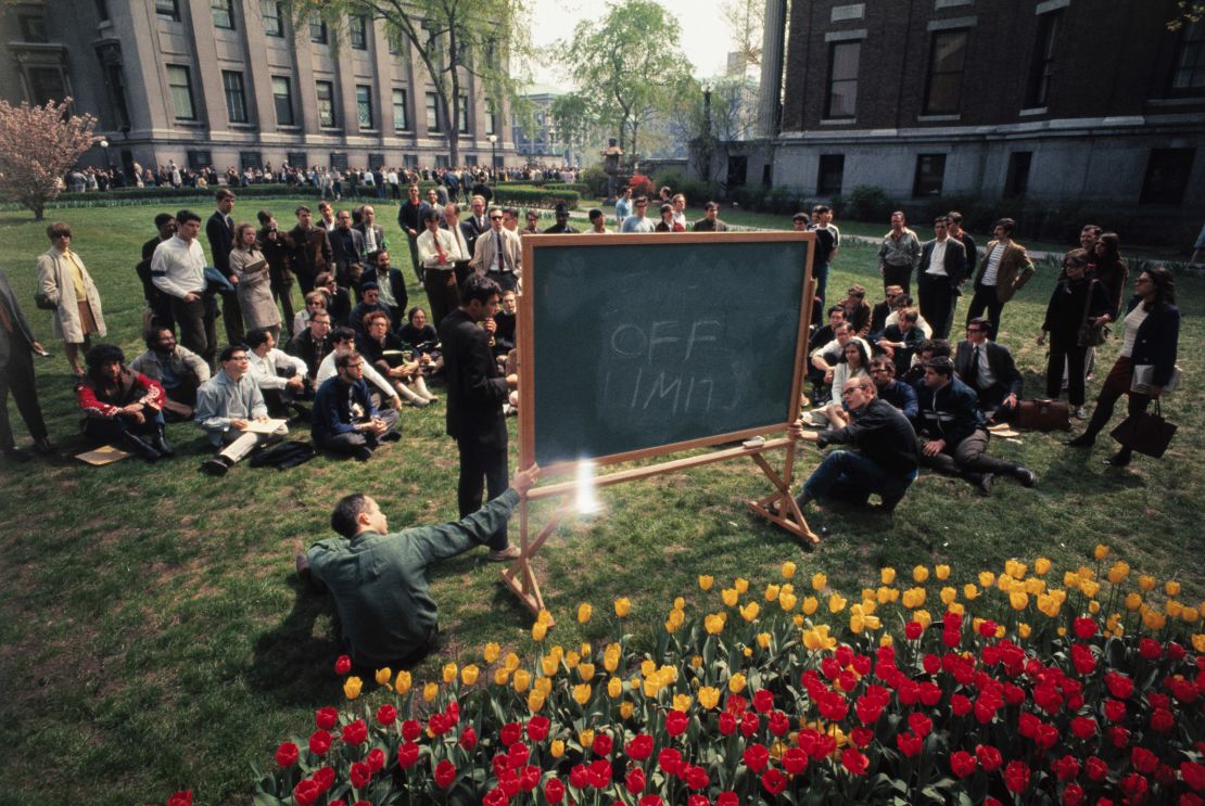 Professor Stephen Smale of Berkeley, a guest lecturer in Topology and Structural Stability, holds a class in front of Columbia's University's Low Memorial Library. The library, at left rear, and the mathematics building, right, were both held by student demonstrators.