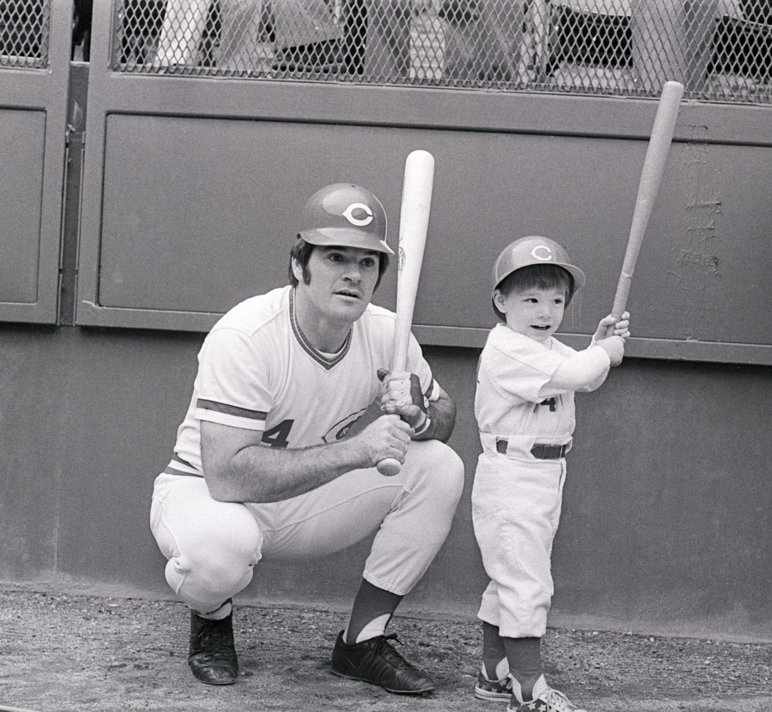 Rose gives batting tips to his young son, Pete Rose Jr., in 1972.