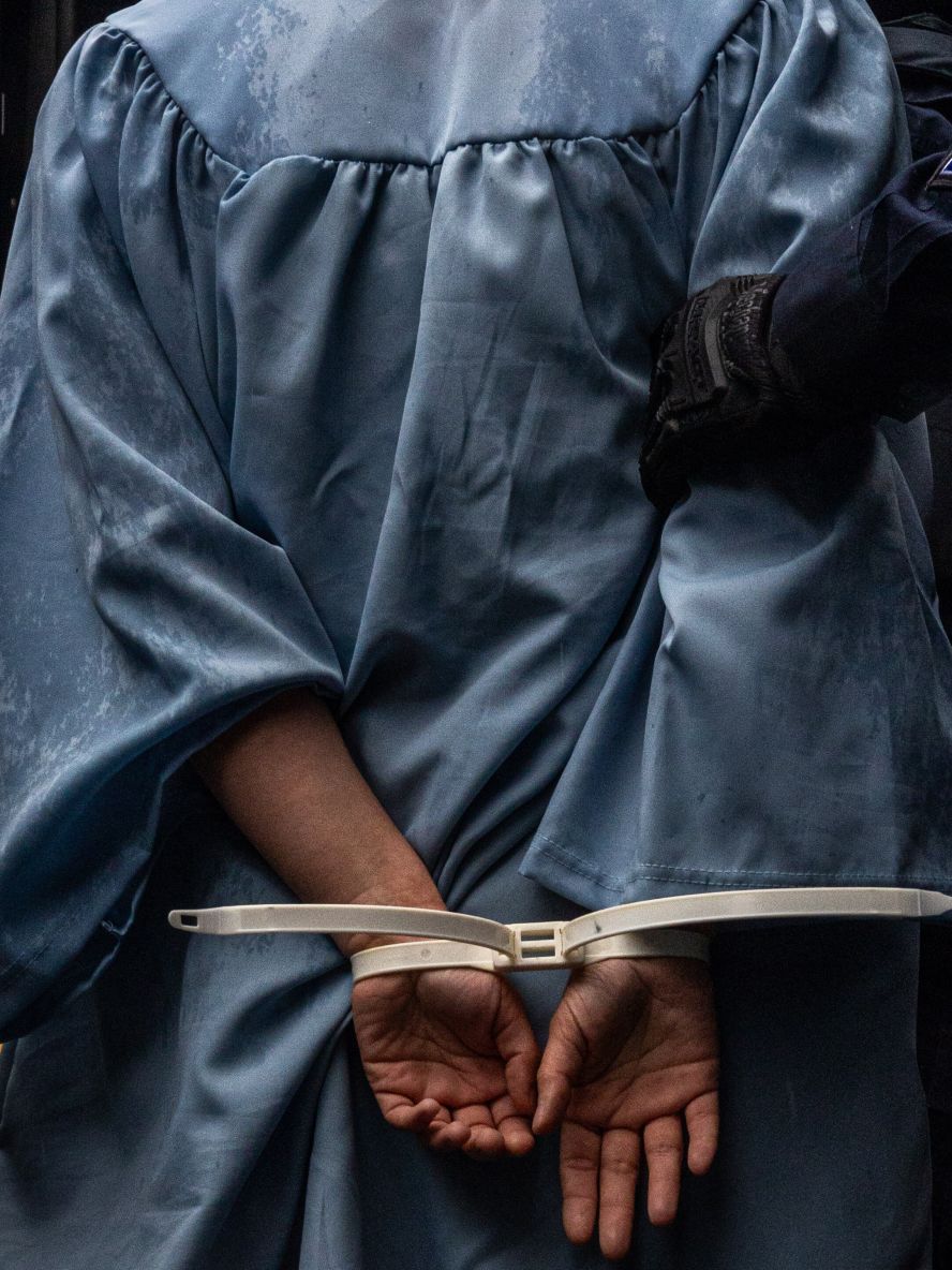 A person’s hands are tied outside Columbia University’s graduation ceremony in New York on Wednesday, May 21. <a href="https://www.cnn.com/2025/05/20/politics/video/students-boo-university-president-columbia-commencement-digvid">Videos</a> showed Columbia students chanting “Free Mahmoud” and booing acting university president Claire Shipman during her commencement speech. Khalil, a Palestinian activist who helped lead Columbia’s student protest movement demanding a ceasefire in Gaza, <a href="https://www.cnn.com/2025/03/11/us/mahmoud-khalil-columbia-ice-green-card-hnk/index.html">was arrested and detained by federal agents</a> on March 8. His lawyer said his green card was revoked by the Trump administration. He is being held at a <a href="https://www.cnn.com/2025/05/22/us/mahmoud-khalil-columbia-immigration-hearing">detention center in Louisiana</a>. A federal district judge has <a href="https://www.cnn.com/2025/03/19/us/mahmoud-khalil-palestinian-activist-trump">blocked</a> his immediate removal from the country.