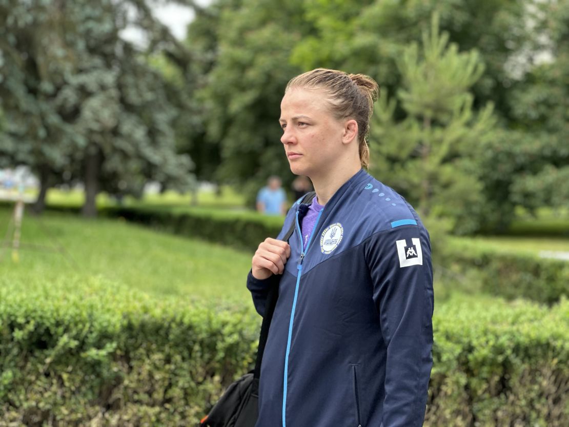 Wrestler Iryna Kolyadenko walks around the training base where she met the start of Russia's full-scale invasion in February 2022 and is now preparing for the Paris Olympics.