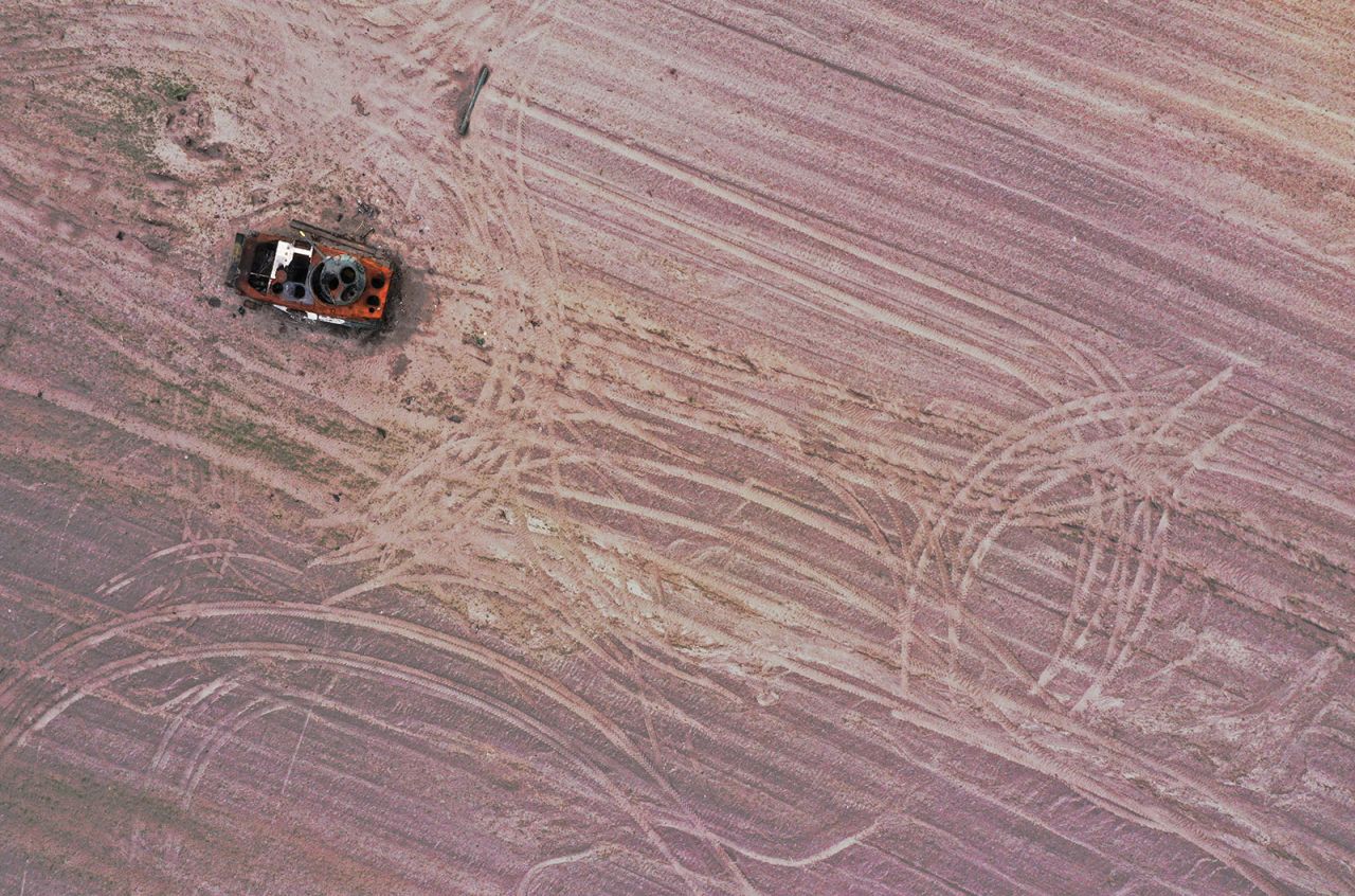 A drone image shows a military vehicle in a grain field previously mined with explosives in the Chernihiv region of Ukraine on May 24. 