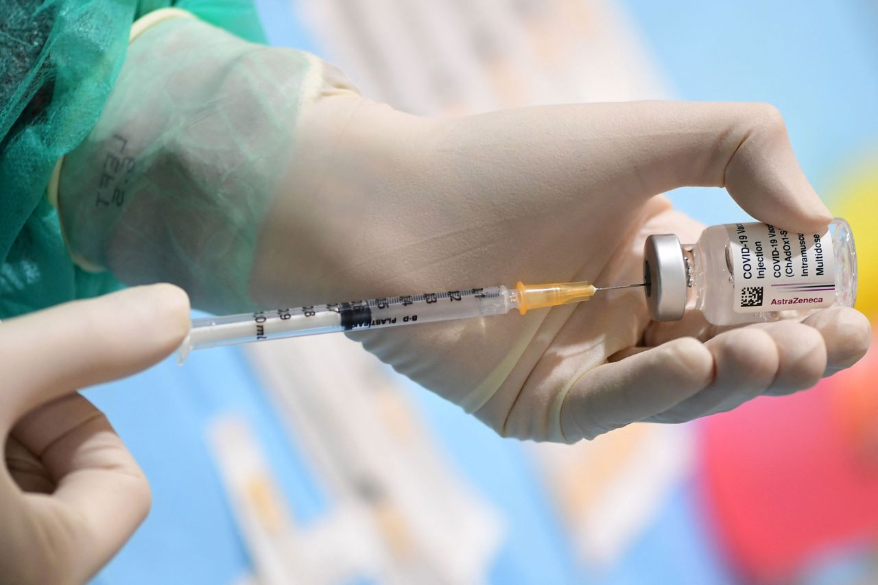 A medical worker fills a syringe from a vial of the British-Swedish AstraZeneca/Oxford vaccine on March 9 at the National Museum of Science and Technology Leonardo Da Vinci in Milan, Italy.