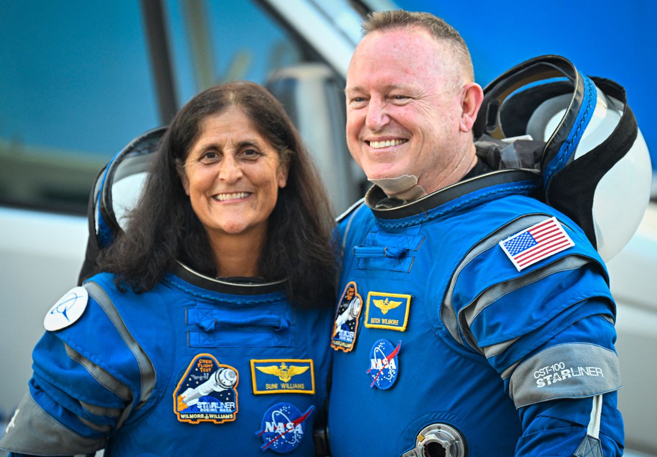 NASA astronauts Suni Williams, left, and?Butch Wilmore pose at Kennedy Space Center in Florida on June 5 before boarding the Boeing Starliner spacecraft for the crew flight test launch.  