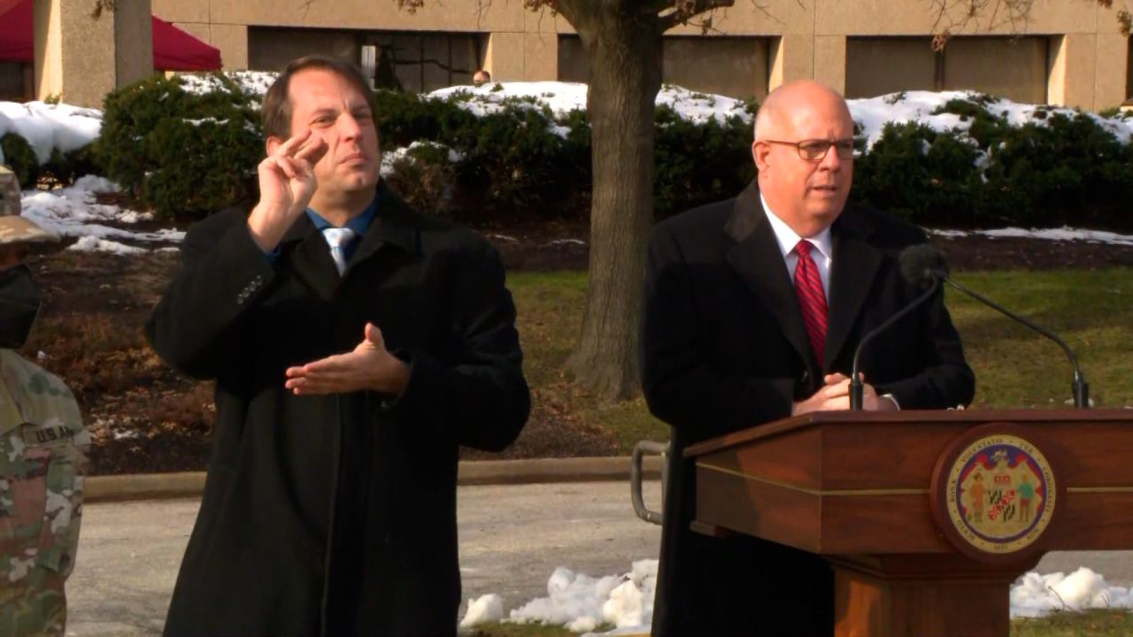 Maryland Gov. Larry Hogan, right, speaks during a briefing in Laurel, Maryland, on January 6.