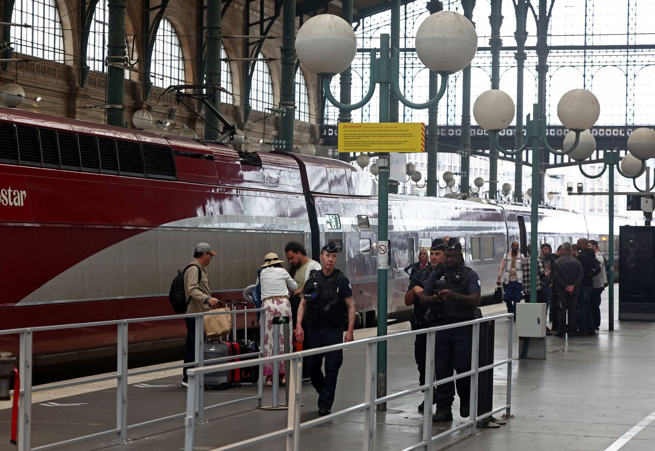 Police officers patrol Gare du Nord station in Paris, after threats against France's rail network, on Friday, July 26.