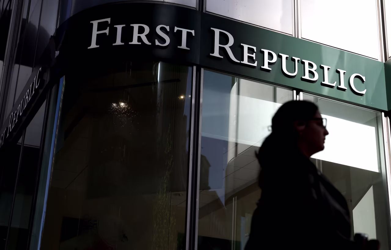 A pedestrian walks by a First Republic bank on April 26, in San Francisco, California. 