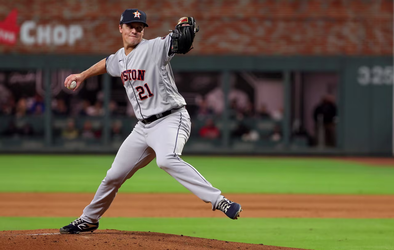 Zack Greinke of the Astros delivers a pitch against the Atlanta Braves in Game Four.