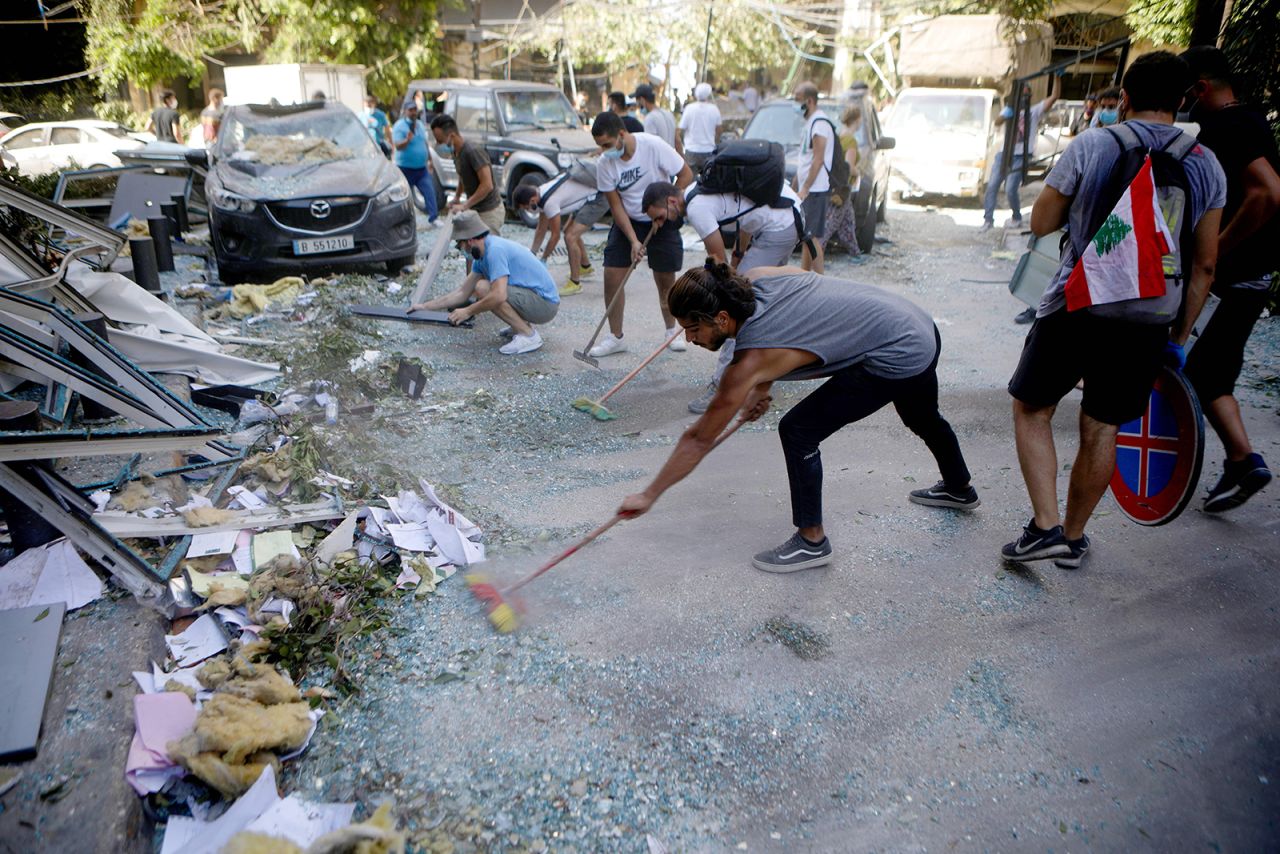 Lebanese activists take part in a campaign to clean the damaged neighbourhood of Gemmayze in Beirut on August 5.