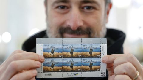 Ihor Smilianskyi CEO of the Ukrainian post holds the new postage stamp immortalizing the famous exchange on Snake Island between Russian and Ukrainian forces at the postal headquarters in Kyiv, Ukraine on April 14. 