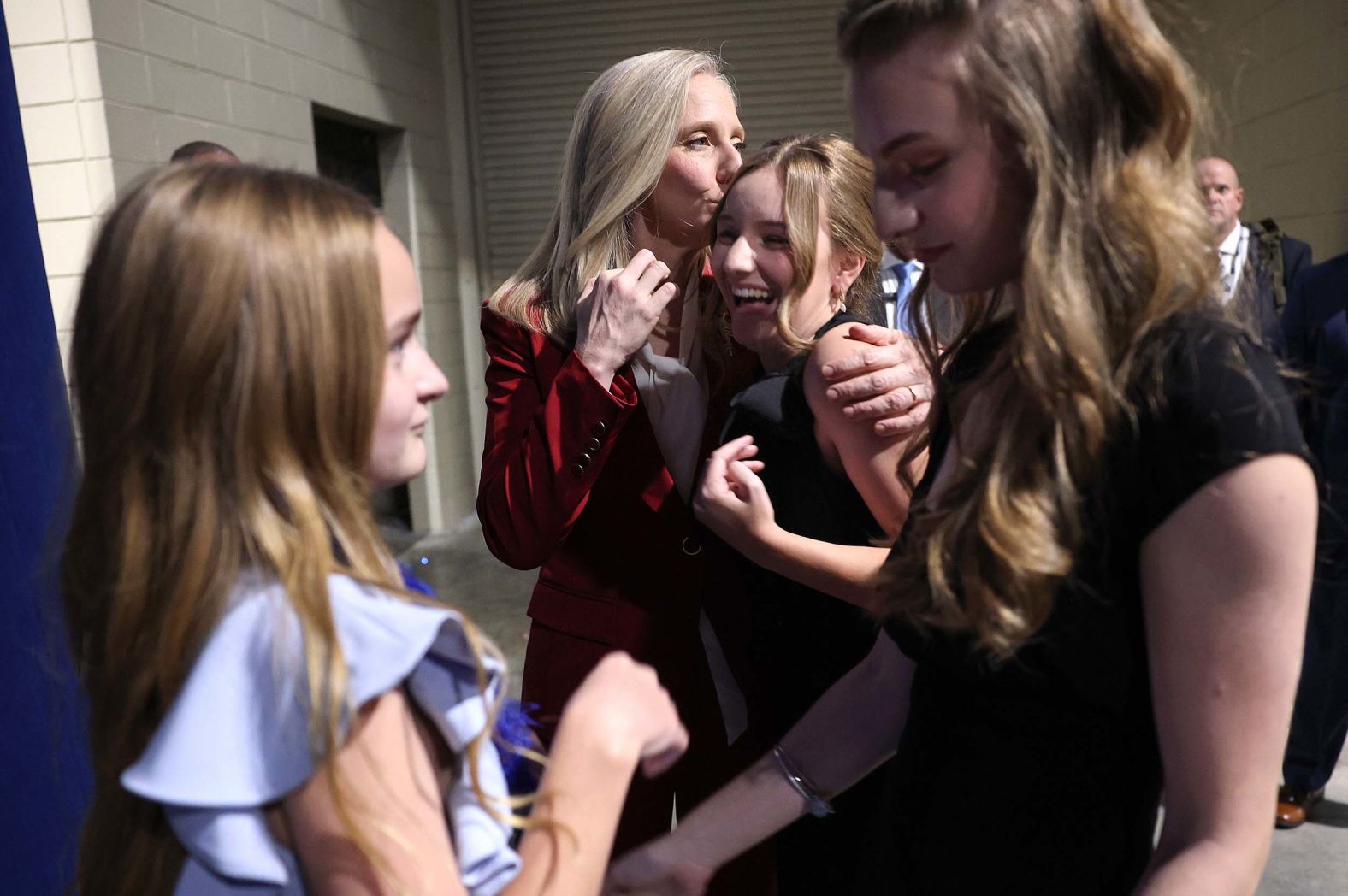 Abigail Spanberger embraces her daughter Charlotte near her other daughters, Claire and Catherine, at an election-night rally in Richmond, Virginia, on Tuesday, November 4. Spanberger, a former Democratic congresswoman and CIA officer, <a href="index.php?page=&url=https%3A%2F%2Fwww.cnn.com%2F2025%2F11%2F04%2Fpolitics%2Fvirginia-governor-abigail-spanberger-wins">has been elected Virginia’s next governor</a>. She will become the state’s first female chief executive.