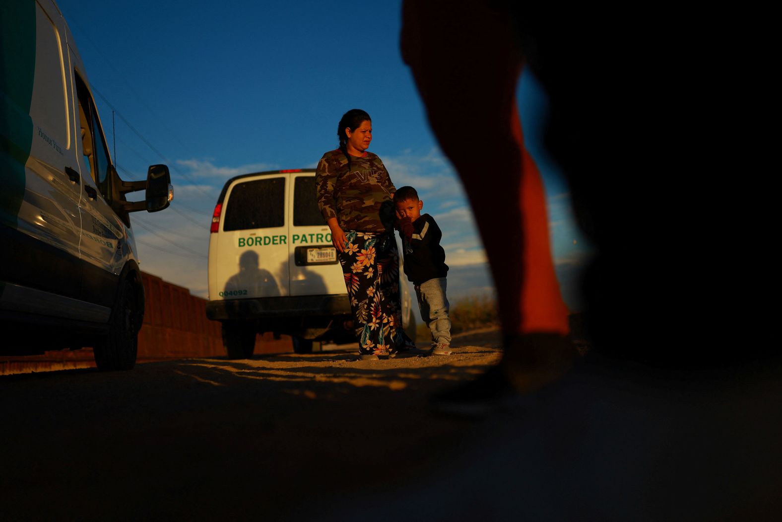 Fabiola, a pregnant Venezuelan migrant traveling with her 3-year-old son, is detained by US Border Patrol agents in Sunland Park, New Mexico, after crossing into the United States from Mexico on Friday, August 2.
