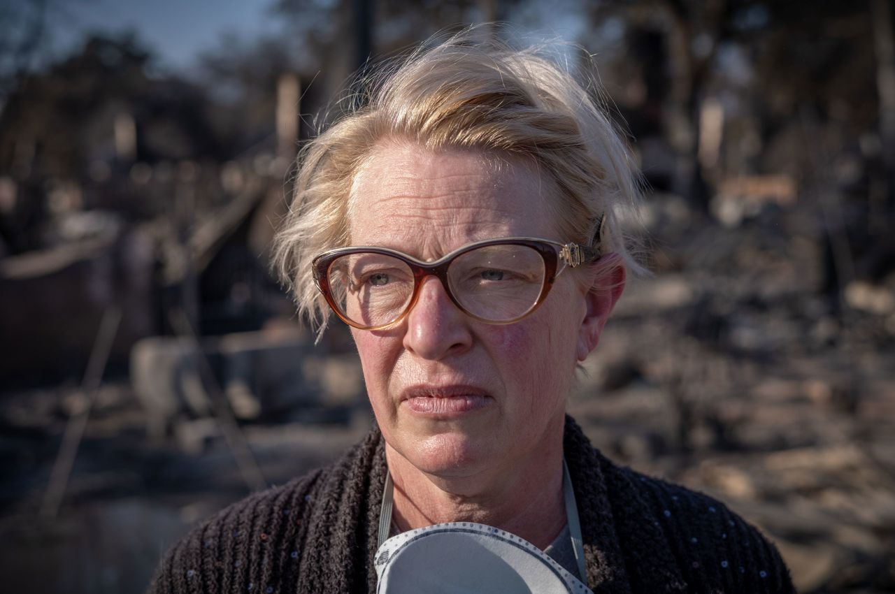 Heidi Luest stands in the middle of her property and looks out over the ruins of her workshop and studio, where she had stores of mock-up props for Lady Gaga and Katy Perry. “It feels like we're in a war zone," she says, "and we can't fight it because it's Mother Nature."