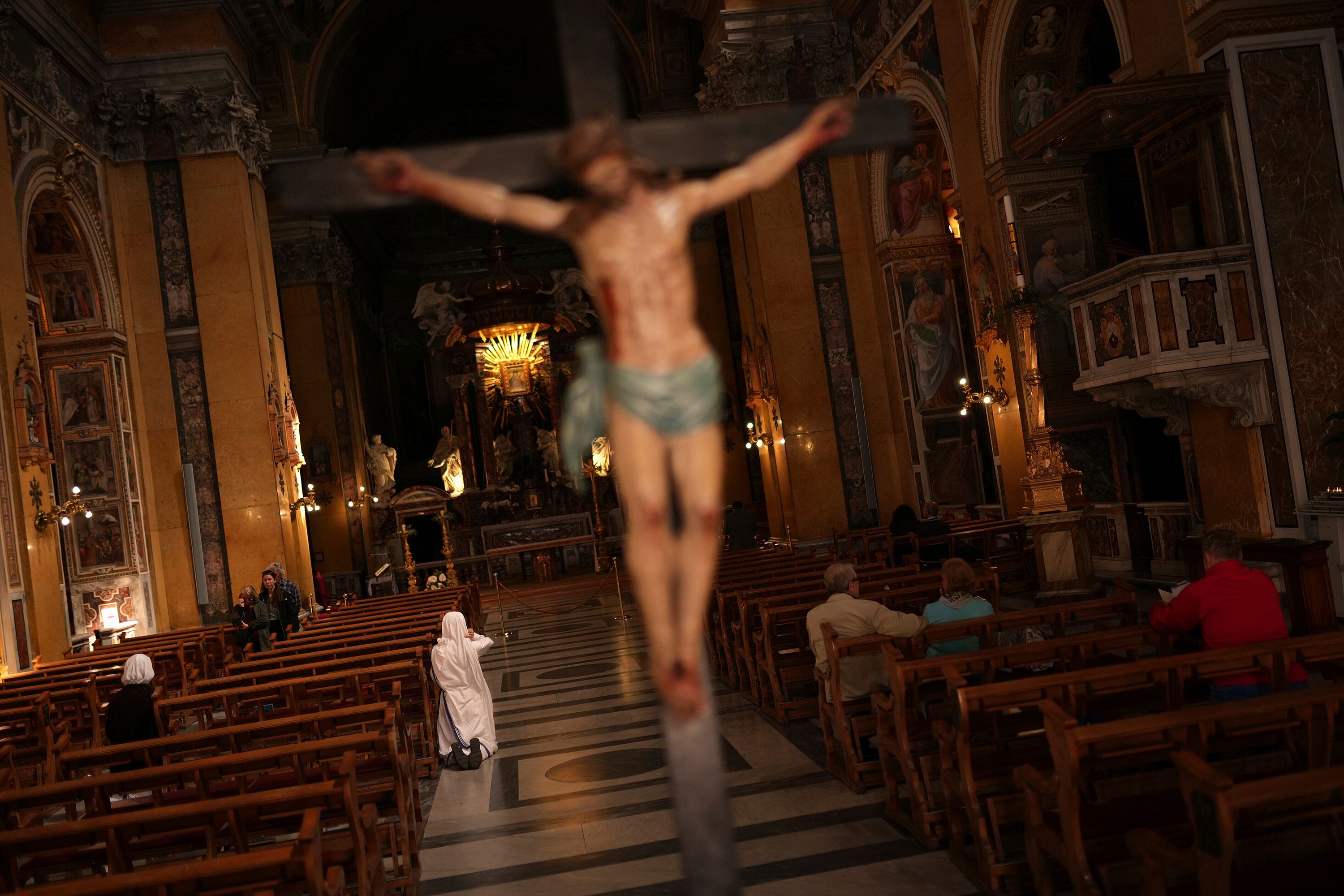 A nun prays inside the Church of Santa Maria in Traspontina, which is near the Vatican.