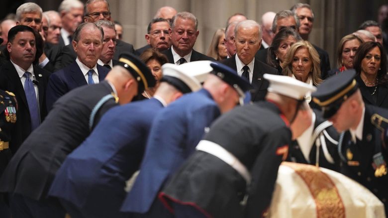 Former Presidents front row from left, George W. Bush with Laura Bush and Joe Biden with Jill Biden, and other invited dignitaries, look on during the funeral for former Vice President Dick Cheney at the Washington National Cathedral on Thursday, Nov. 20, 2025 in Washington. (AP Photo/Matt Rourke)