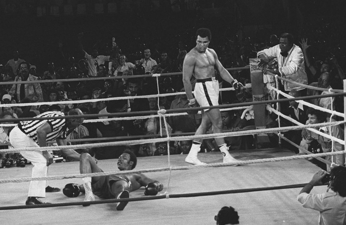 Referee Zack Clayton counts Foreman out in the eighth round of the Rumble in the Jungle.