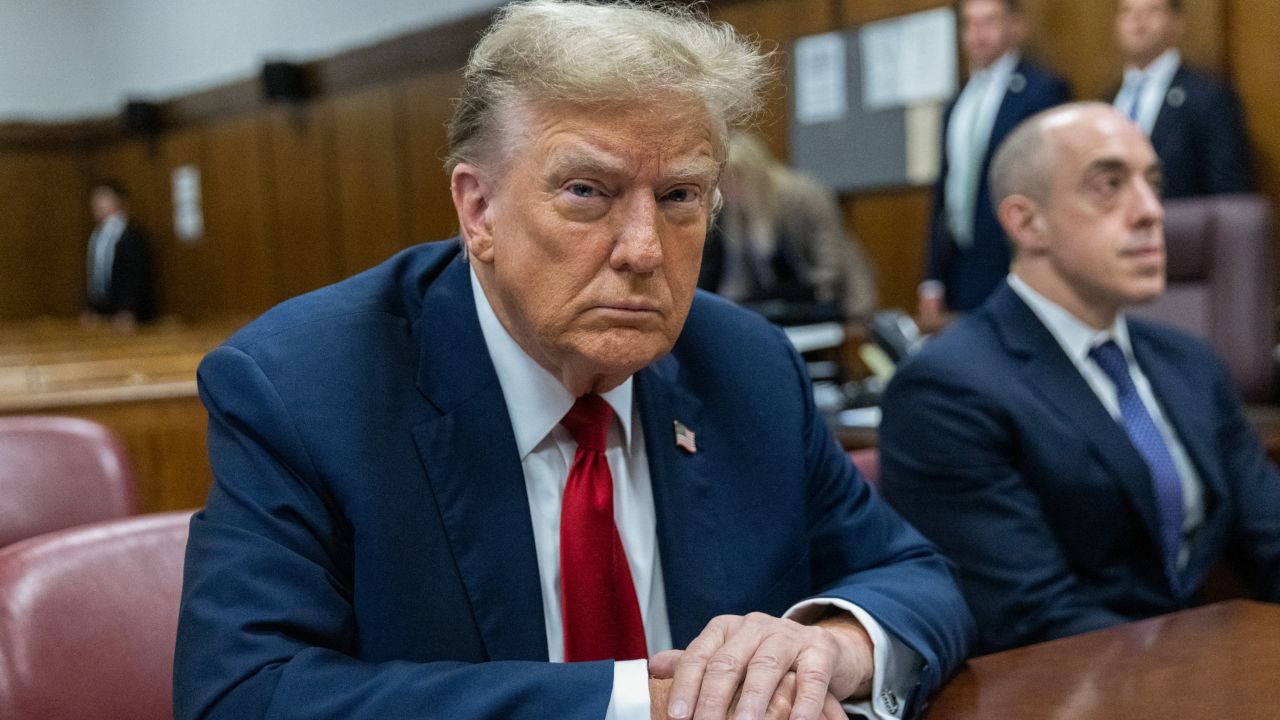 Former US President Donald Trump attends the first day of his trial for allegedly covering up hush money payments linked to extramarital affairs, at Manhattan Criminal Court in New York City on April 15, 2024. Donald Trump is in court Monday as the first US ex-president ever to be criminally prosecuted, a seismic moment for the United States as the presumptive Republican nominee campaigns to re-take the White House. The scandal-plagued 77-year-old is accused of falsifying business records in a scheme to cover up an alleged sexual encounter with adult film actress Stormy Daniels to shield his 2016 election campaign from adverse publicity. (Photo by JEENAH MOON / POOL / AFP) (Photo by JEENAH MOON/POOL/AFP via Getty Images)
