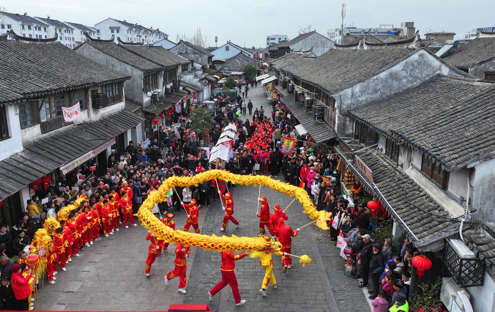 Folk dancers perform a dragon dance in celebration of the upcoming Lunar New Year of the Snake in Taicang, Jiangsu province, China, on Friday, January 24.