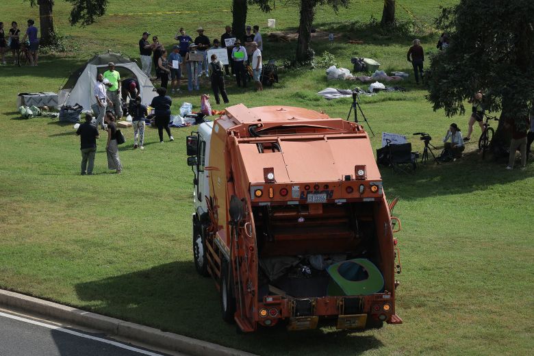 A homeless encampment near the Lincoln Memorial is cleared by employees of the Washington DC government on August 14, 2025.