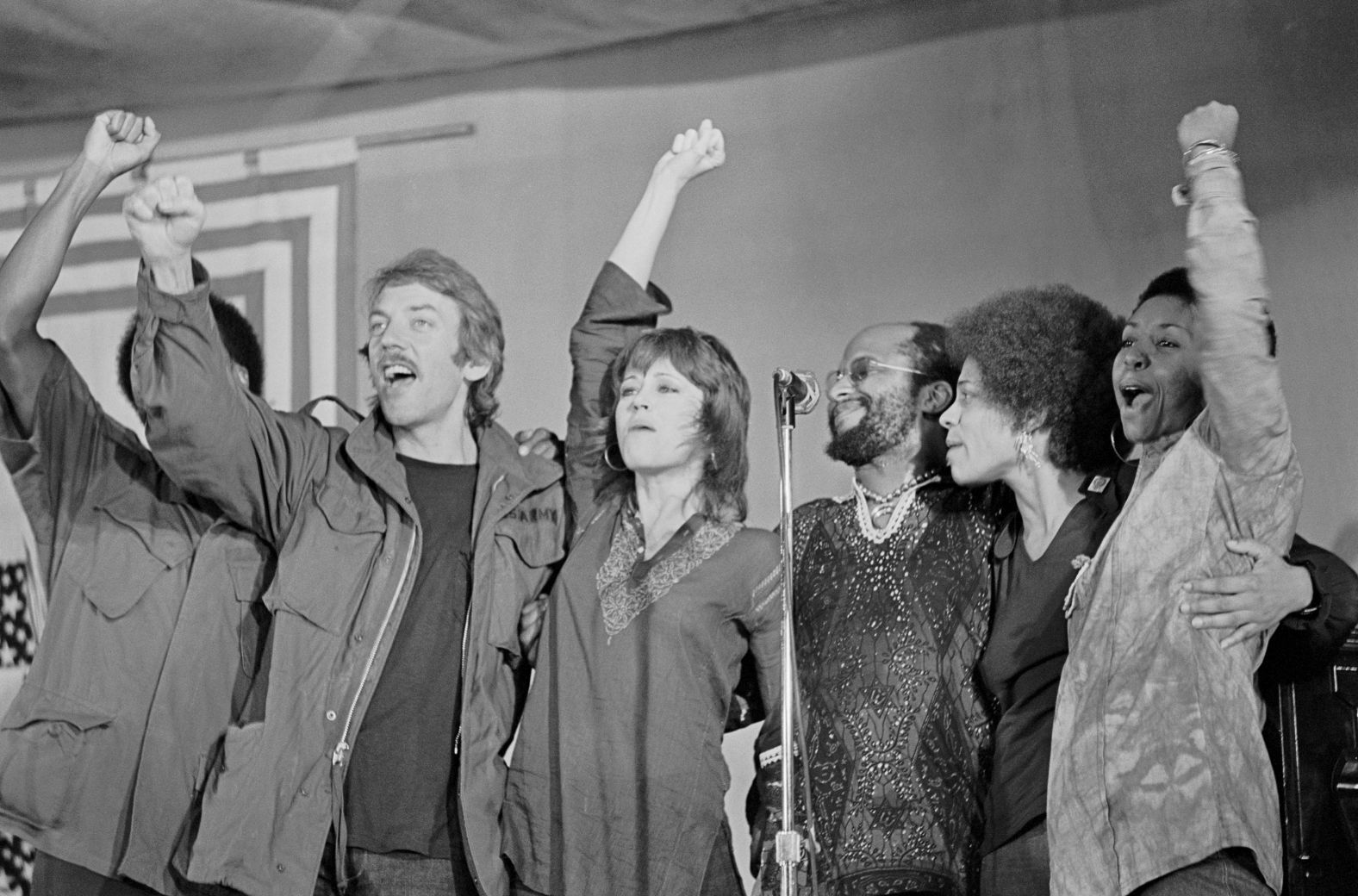 Sutherland and "Klute" co-star Jane Fonda, center, perform in an anti-war show in 1971. Fonda and Sutherland also had an off-screen relationship around the time they made the film.