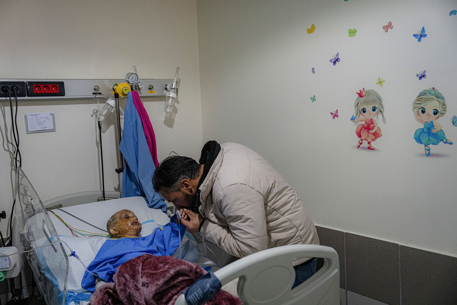 Celine Ali Nassif, a 3-year-old who suffered second-degree burns and a fractured leg in an Israeli airstrike, is kissed by her uncle Dr. Hassan Nassif at a hospital in Baalbek, Lebanon, on Friday, November 1. Her home was hit by an airstrike on October 28, killing seven members of her family and flinging her into the street. For weeks, Israel has been carrying out a <a href="index.php?page=&url=https%3A%2F%2Fwww.cnn.com%2F2024%2F10%2F31%2Fmiddleeast%2Fisrael-military-leaders-gaza-lebanon-intl%2Findex.html">massive bombing campaign in Lebanon</a> as it targets the Iran-backed militant group Hezbollah.