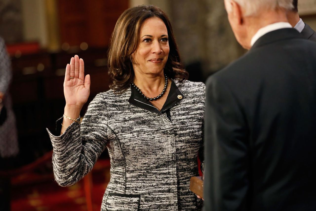  Harris, as a new member of the Senate, participates in a re-enacted swearing-in with Vice President Joe Biden in January 2017. She is the first Indian American and the second African American woman to serve as a US senator.