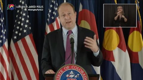 Colorado Gov. Jared Polis speaks during a press conference on Tuesday.