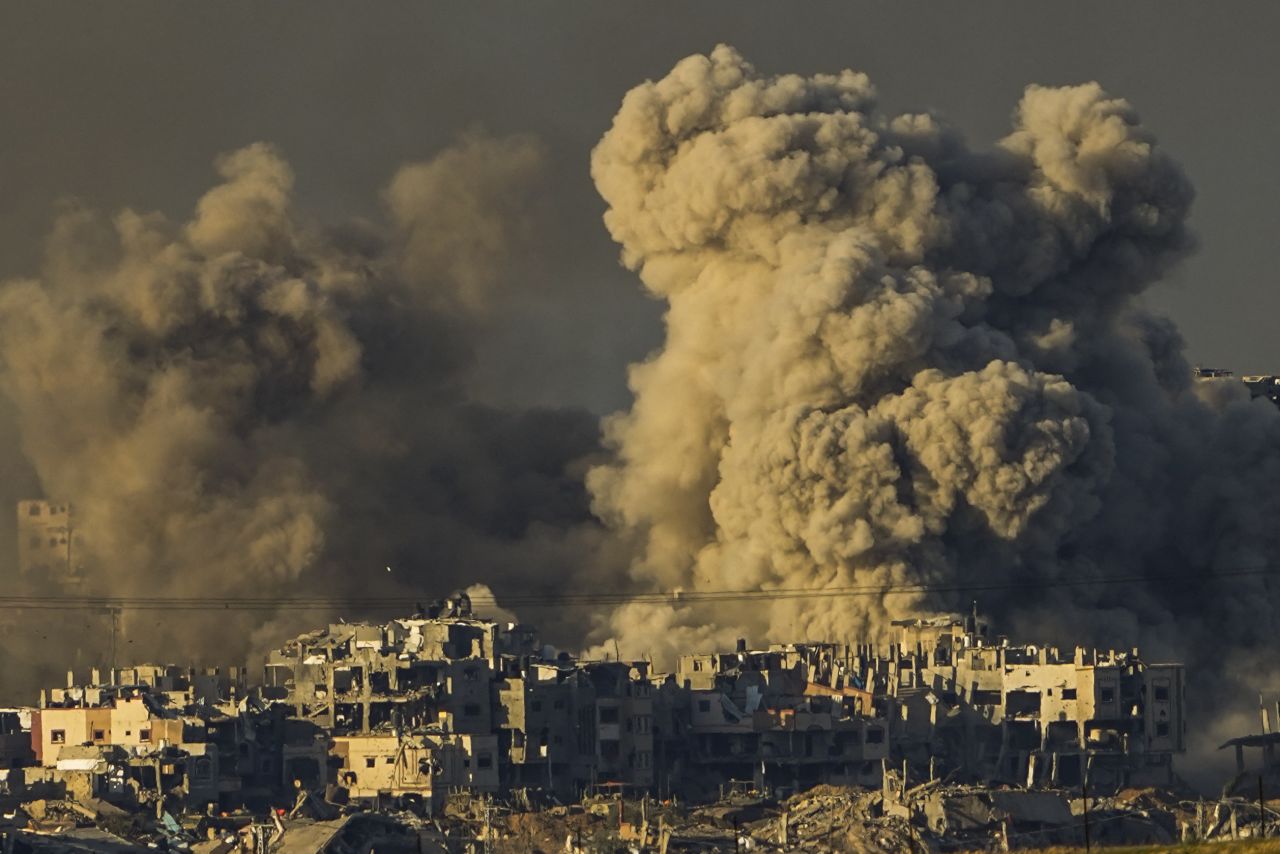 Smoke rises following an Israeli bombardment in Gaza, as seen from southern Israel, on Saturday, December 16.