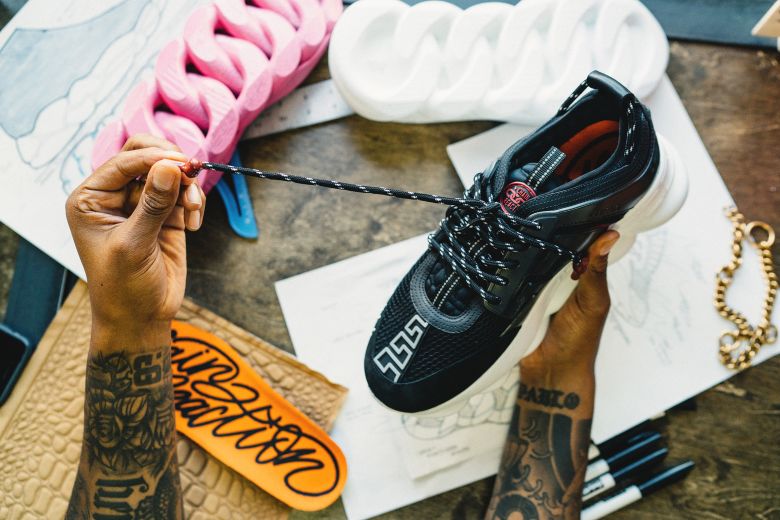 A Versace Chain Reaction sneaker, featuring a chunky sole inspired by a thick gold chain.