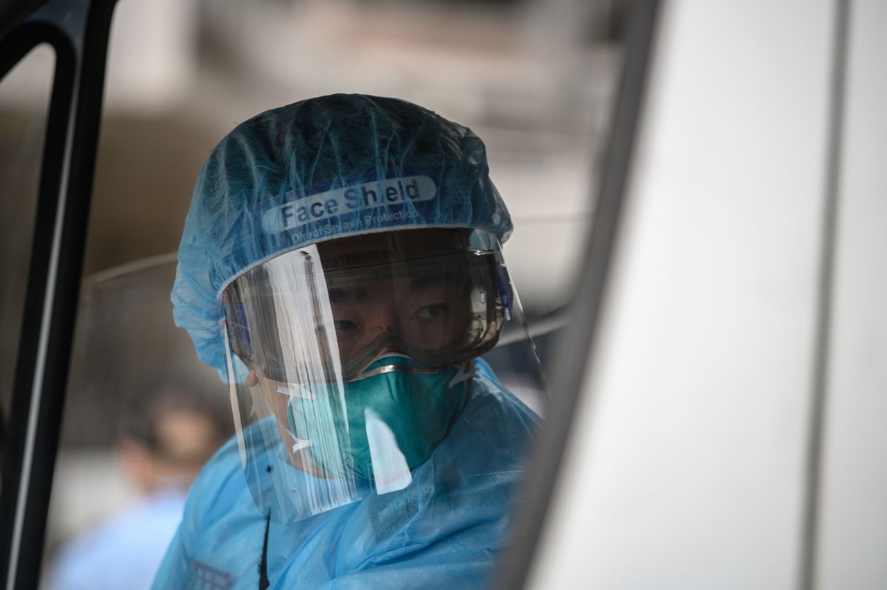 An ambulance driver at Princess Margaret Hospital in Hong Kong on January 26, 2020.