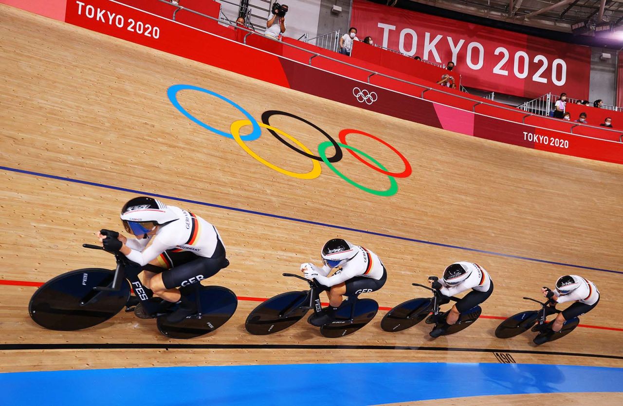 Franziska Brausse, Lisa Brennauer, Lisa Klein and Mieke Kroeger of Team Germany sprint to setting a new Olympic record during the women's team pursuit on August 3, in Izu, Japan.