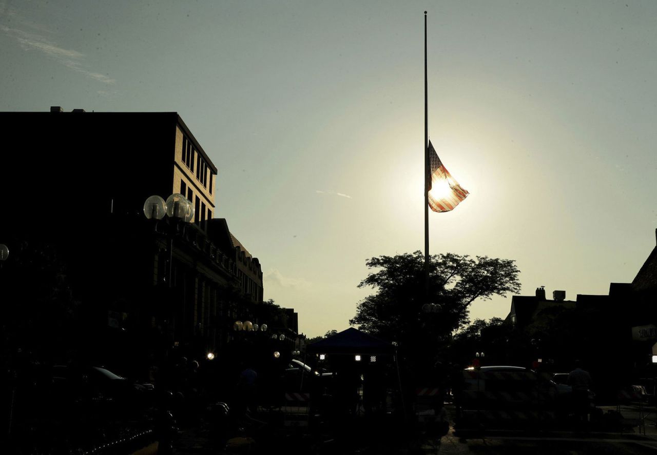 An American flag is flown at half-staff in Highland Park, Illinois, on July 5. 