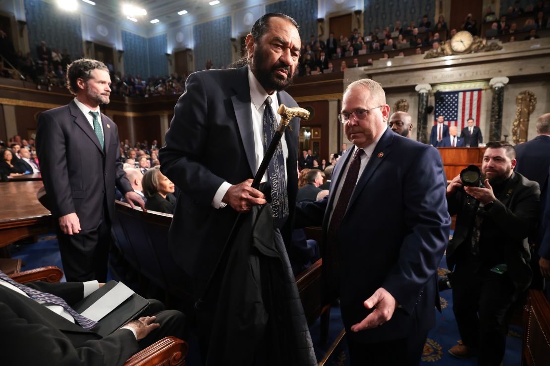 Rep. Al Green is removed from the chamber as President Donald Trump addresses a joint session of Congress March 4 at the Capitol.