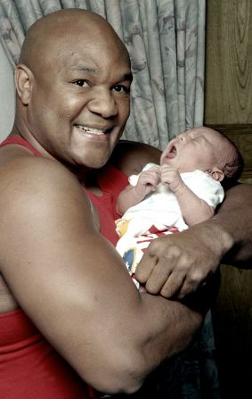 Foreman holds his 1-week-old son, George Foreman III, in Houston in 1983. He had five sons and seven daughters. All of his sons are named George.