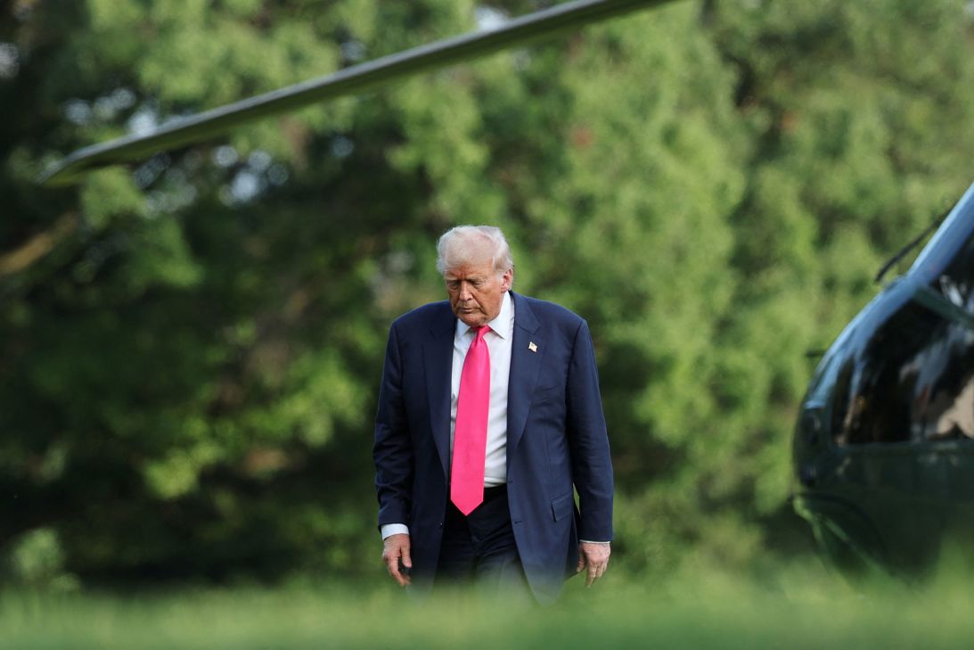 President Donald Trump walks across the South Lawn on July 15.