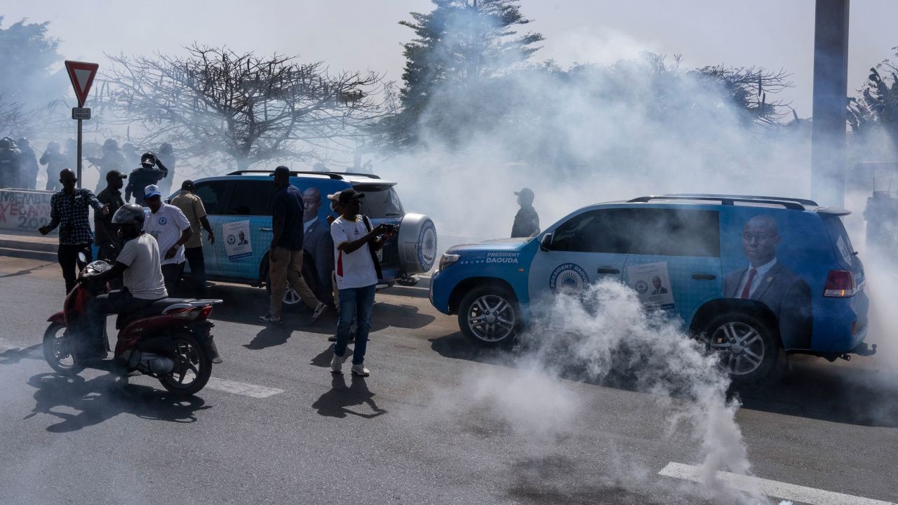 Senegalese riot police lobs tear gas at supporters of opposition presidential candidate Daouda Ndiaye in Dakar, Senegal, Sunday, Feb. 4, 2024.