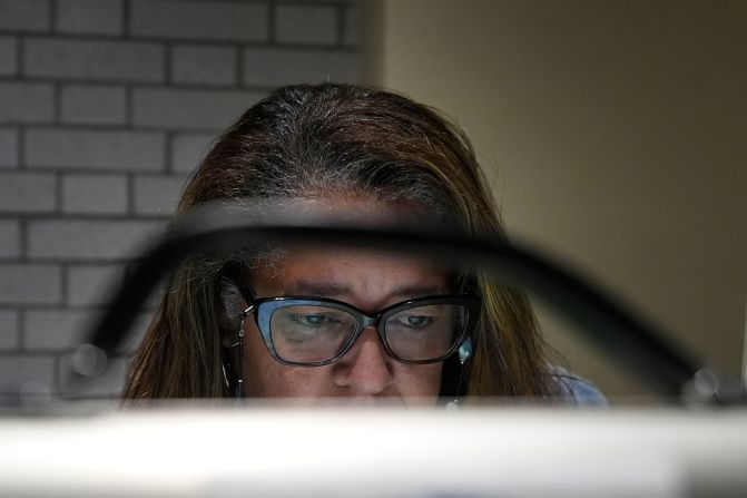 A woman fills out her ballot in Chicago on Tuesday.