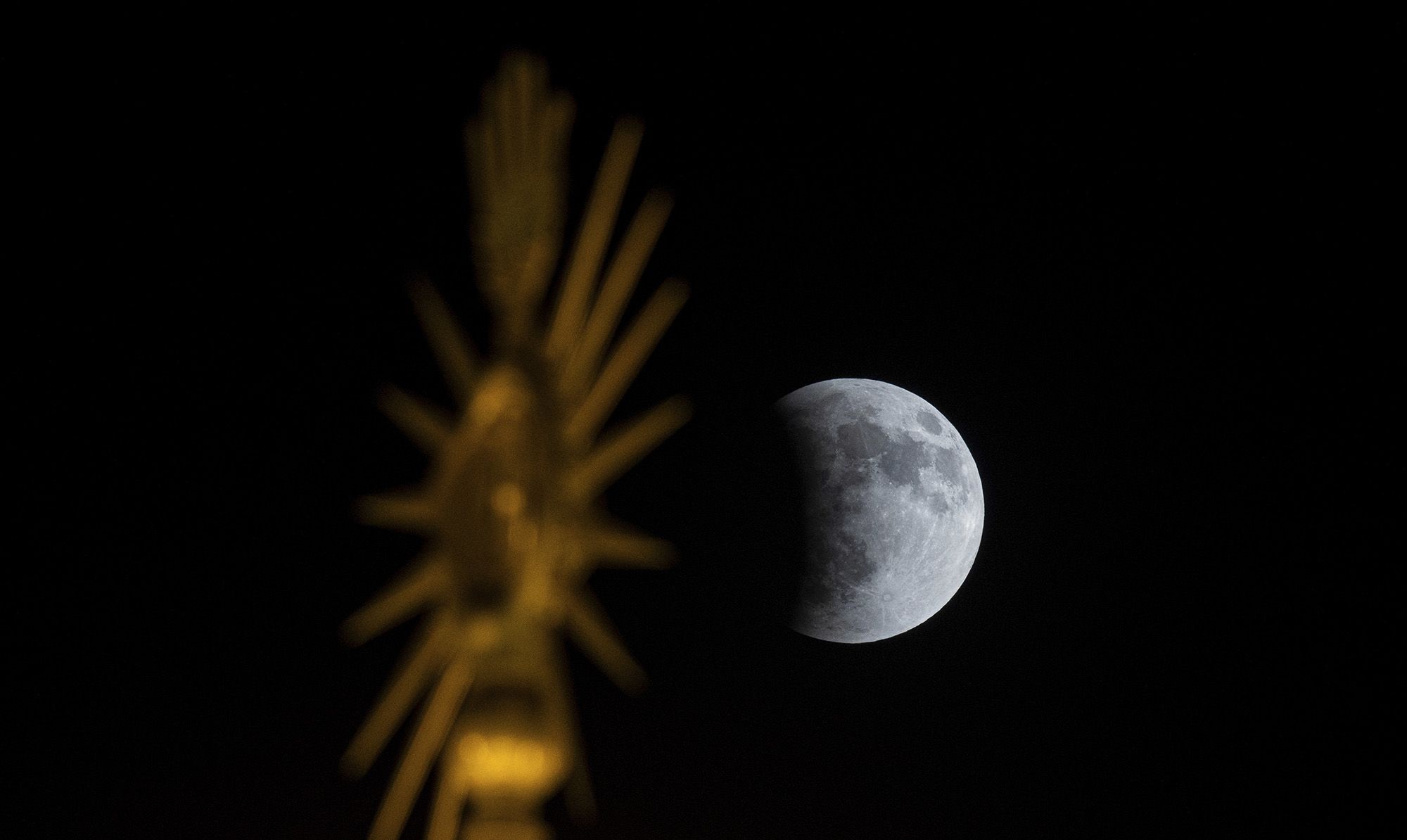 A partial lunar eclipse is seen in Najaf, Iraq.