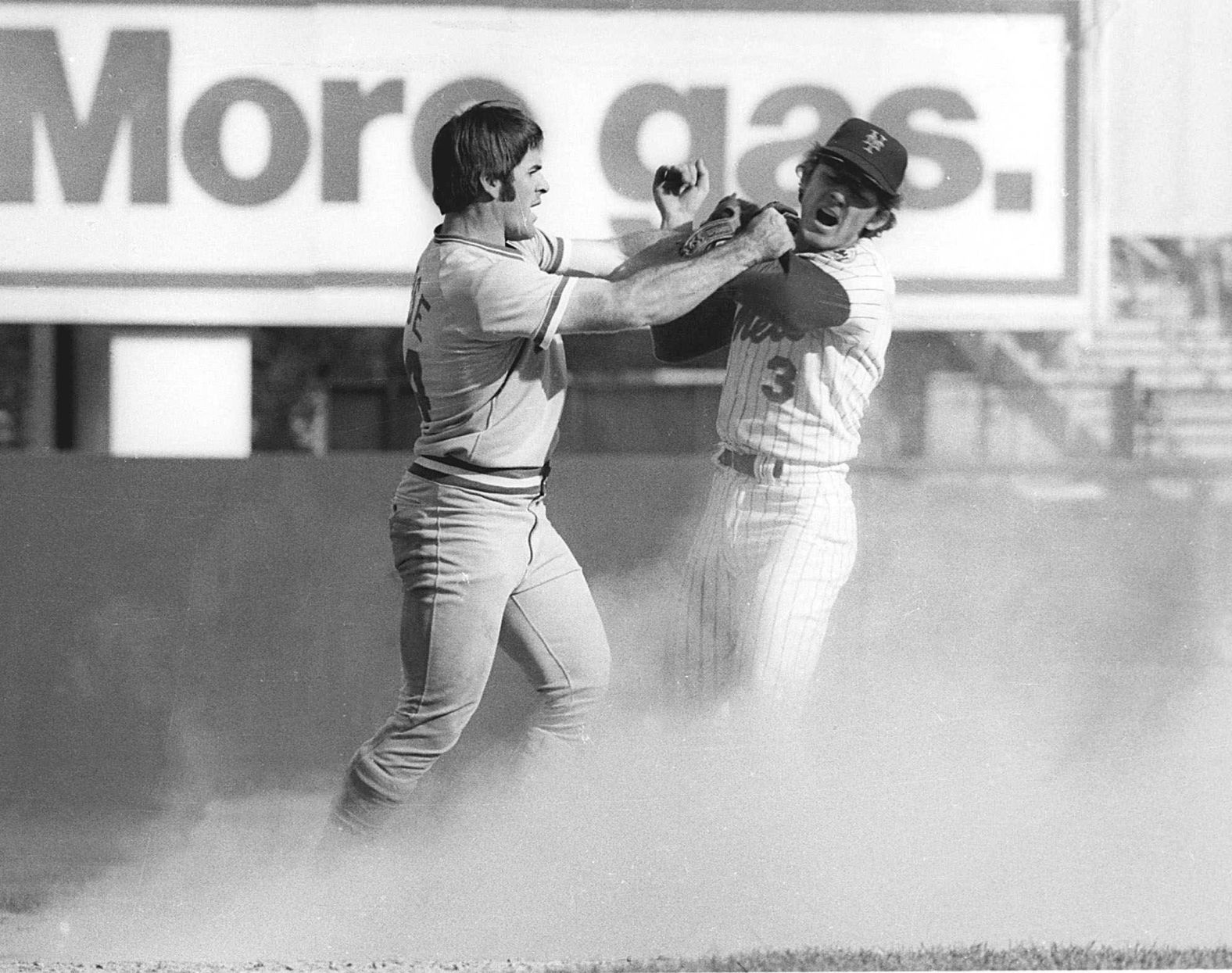 Rose, left, gets into a fight with New York Mets shortstop Bud Harrelson after Rose failed to break up Harrelson's double play in Game 3 of the National League Championship Series in 1973. Both benches and bullpens emptied in the ensuing brawl.