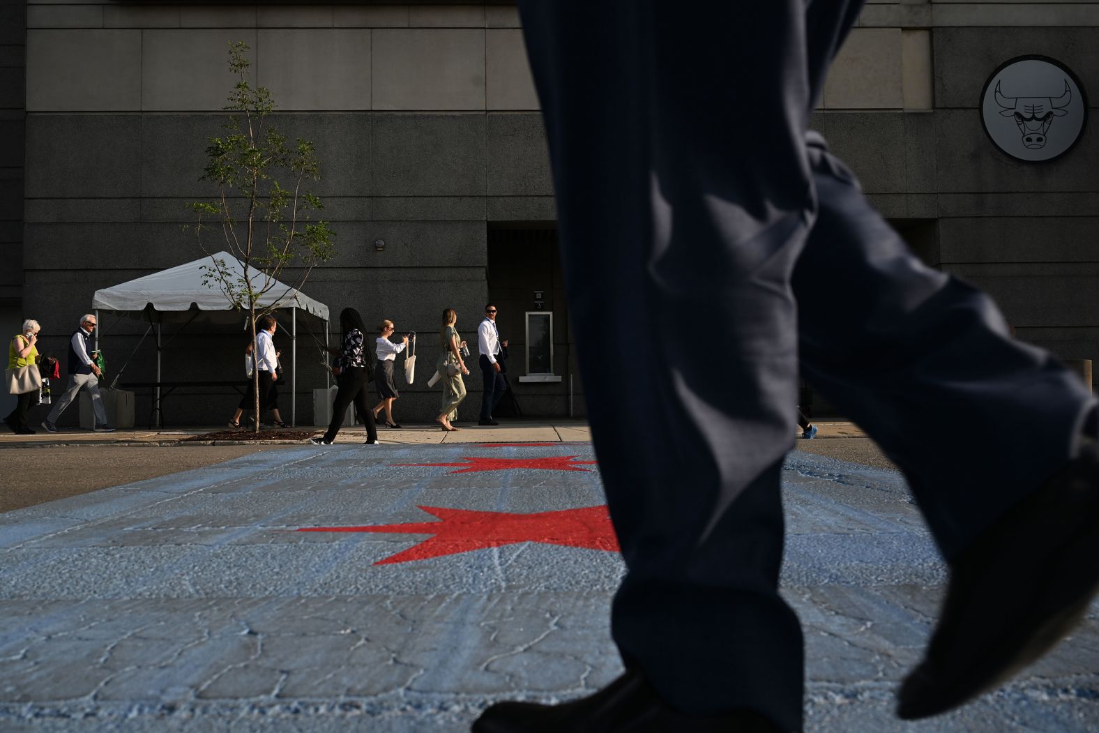 People walk outside the United Center on Thursday.