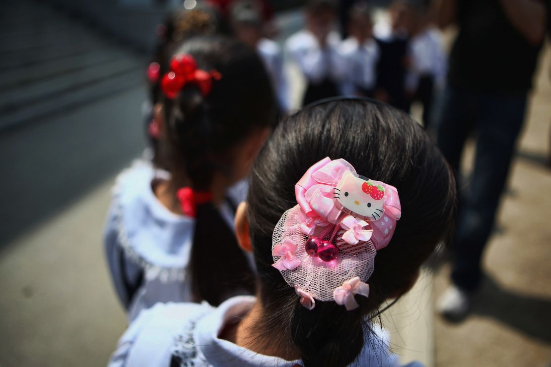 A North Korean child wears a Hello Kitty hairpin at a primary school in the country's capital, Pyongyang, in 2011.