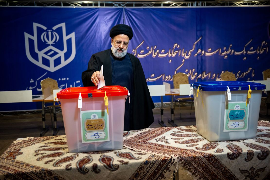 Iranian President Ebrahim Raisi casts his vote at a Tehran polling station, March 1, 2024.