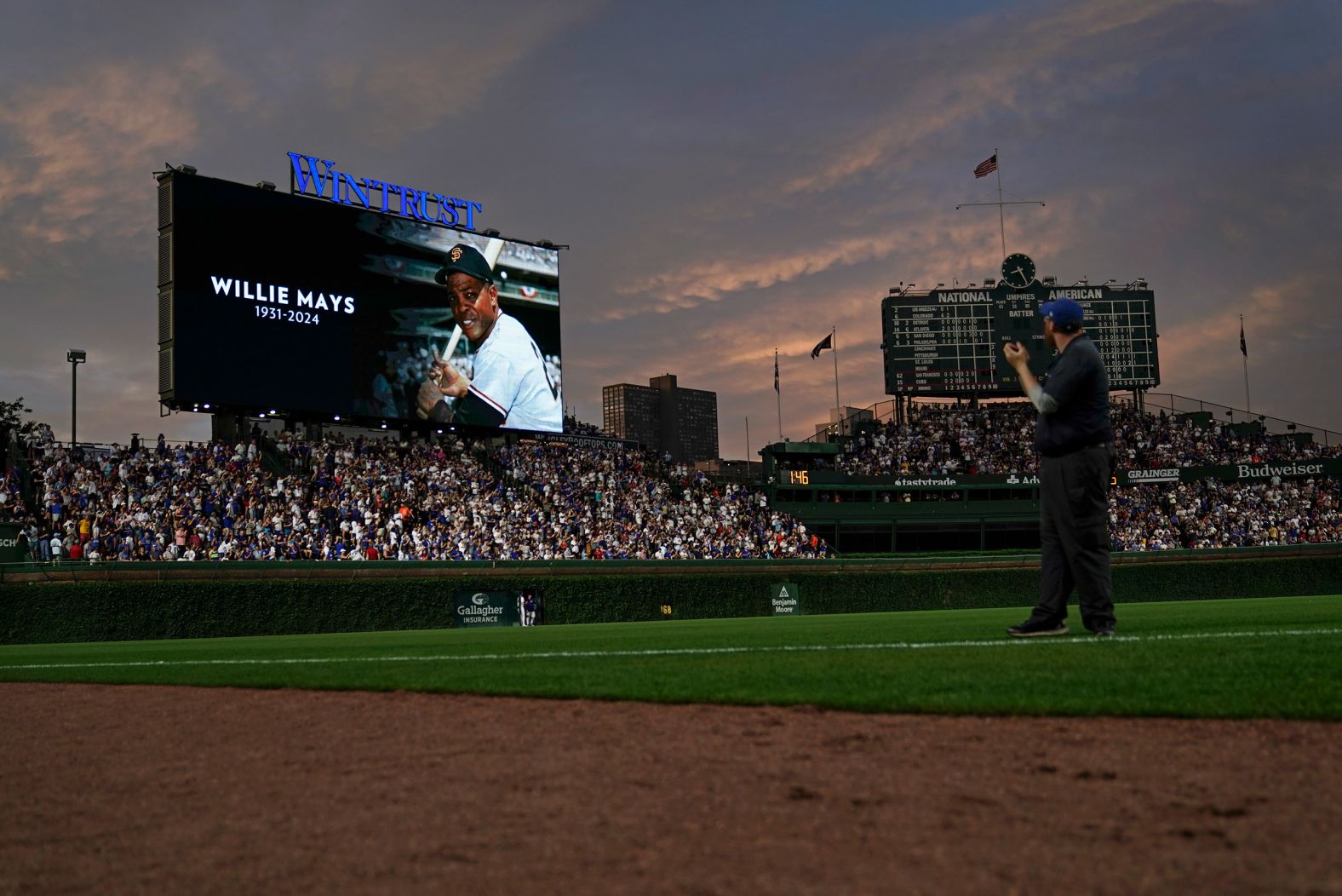 A photo of baseball great Willie Mays is displayed on the Wrigley Field video board in Chicago on Tuesday, June 18. Mays, a Hall of Famer who shined in all facets of the game and made a dramatic catch in the 1954 World Series, <a href="index.php?page=&url=https%3A%2F%2Fwww.cnn.com%2F2024%2F06%2F18%2Fsport%2Fwillie-mays-dies%2Findex.html">died Tuesday</a> at the age of 93. <a href="index.php?page=&url=http%3A%2F%2Fwww.cnn.com%2F2024%2F06%2F18%2Fus%2Fgallery%2Fwillie-mays-life-in-pictures%2Findex.html">See his life in pictures</a>.