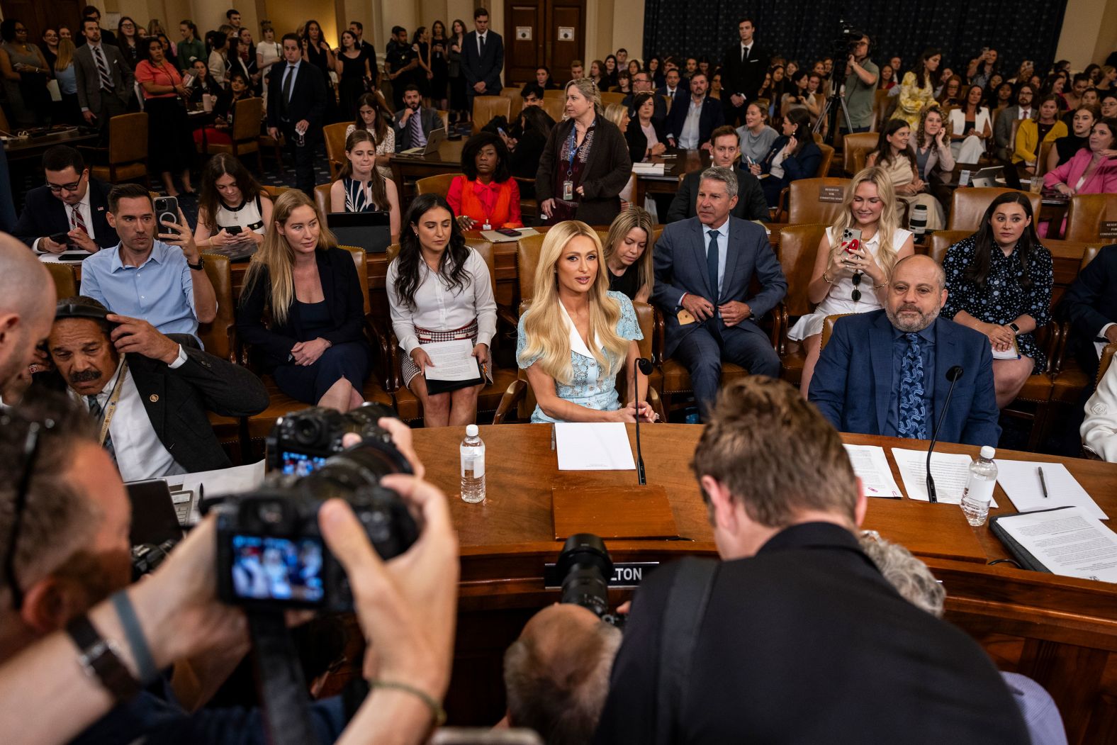 Actress and child welfare advocate Paris Hilton arrives to testify at a House committee meeting in Washington, DC, on Wednesday, June 26. <a href="index.php?page=&url=https%3A%2F%2Fwww.cnn.com%2F2024%2F06%2F26%2Fentertainment%2Fparis-hilton-house-committee-hearing-child-welfare%2Findex.html">The hearing</a> was focused on foster care and the reauthorization of Title IV-B of the Social Security Act, which provides resources to states to promote child welfare. Hilton has previously said that she experienced physical and emotional abuse at a boarding school for troubled teens.