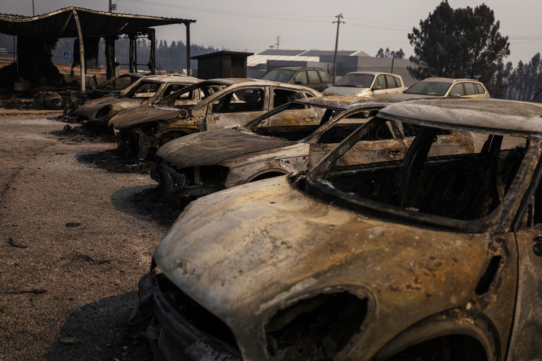 Cars destroyed by a wildfire on a dealership forecourt in Albergaria-a-velha, on September 18.