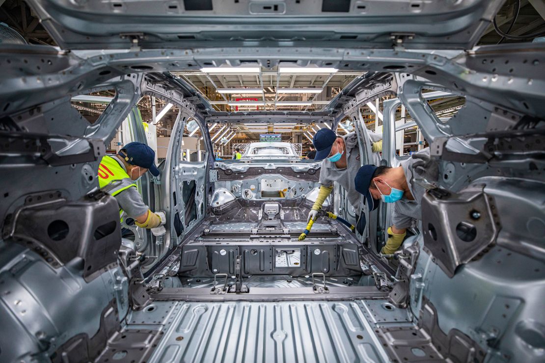 People work at a Volkswagen Anhui factory in Hefei city last September.