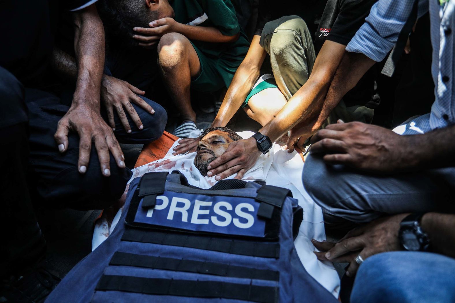 Relatives and colleagues of Reuters cameraman Hussam Al-Masri mourn over his body ahead of his funeral in Khan Younis, Gaza, on Monday, August 25. Israel has faced global condemnation for <a href="index.php?page=&url=https%3A%2F%2Fwww.cnn.com%2F2025%2F08%2F27%2Fmiddleeast%2Fgaza-nasser-hospital-israel-attack-three-strikes-intl">back-to-back strikes on the biggest hospital in southern Gaza</a> this week, which killed at least 22 people, including health workers, emergency response crews and five journalists. On Monday, Israeli Prime Minister Benjamin Netanyahu conceded the incident was a “tragic mishap.” But on Tuesday, the Israeli military defended the assault on the hospital, claiming that six “terrorists” had been killed in the attack, which it said was directed at a “camera that was positioned by Hamas.”