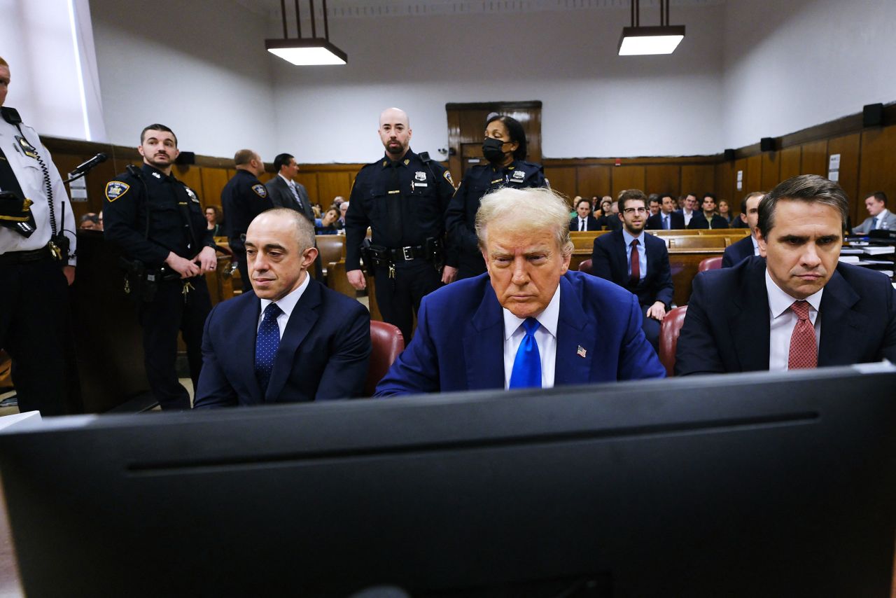 Former President Donald Trump sits with attorneys Emil Bove, left, and Todd Blanche, right, at Manhattan Criminal Court in New York on May 2. 