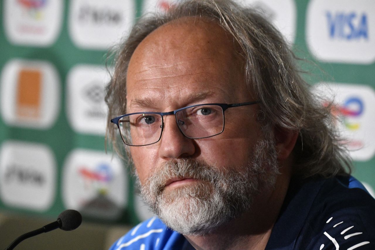 Tom Saintfiet, head coach of the Gambian national football team, speaks at a press conference in 2022.