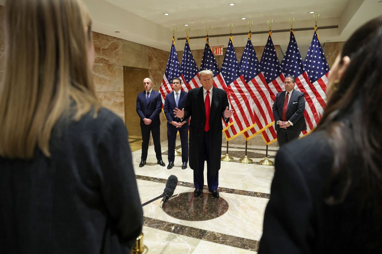 Former President Donald Trump speaks to the press in New York on Monday.