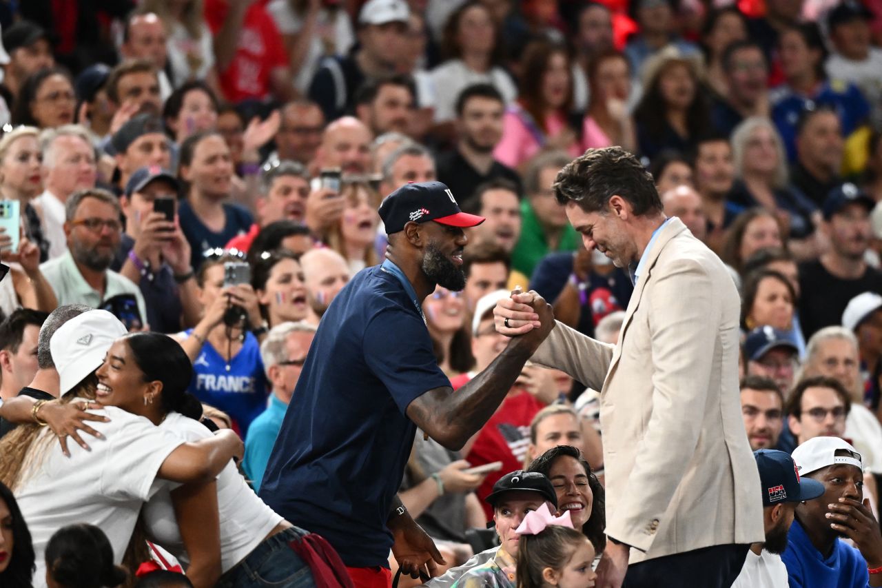 LeBron James and Pau Gasol greet each other prior to the women’s basketball game between the United States and France on August 11.